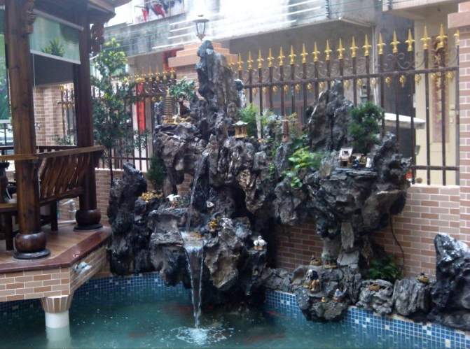 華通園林假山 現代園林中真石頭假山的藝術特點